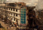 Gul Plaza Karachi fire aftermath showing burnt commercial building and rescue operations