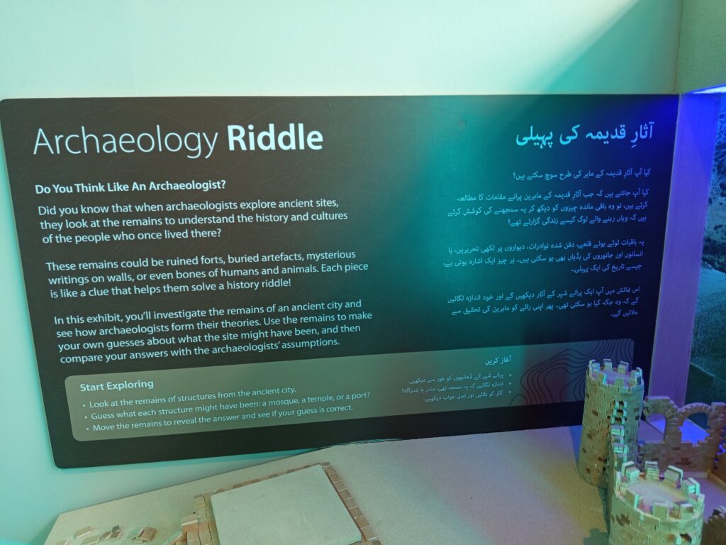 Visitors exploring the Lost Cities of the Indus Delta exhibition showcasing ancient maritime civilizations in Karachi.