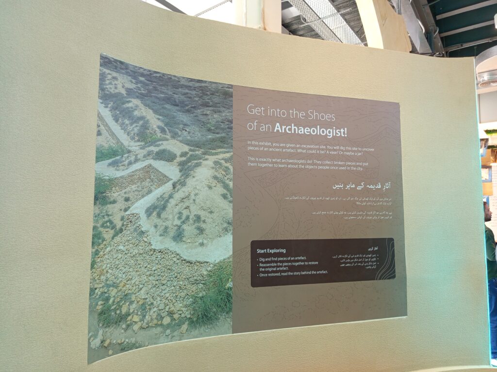 Visitors exploring the Lost Cities of the Indus Delta exhibition showcasing ancient maritime civilizations in Karachi.
