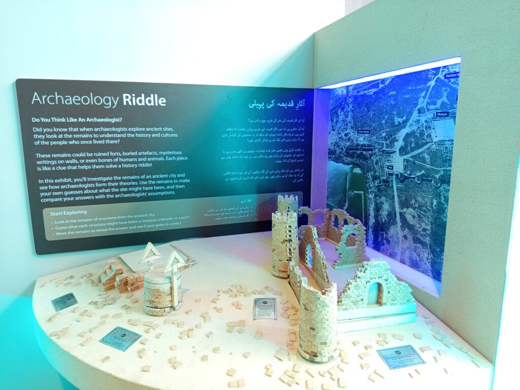 Visitors exploring the Lost Cities of the Indus Delta exhibition showcasing ancient maritime civilizations in Karachi.