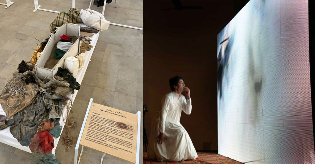 A coffin filled with sand and a child wrapped in a white shroud. The scene is both simple and deeply unsettling at the same time.